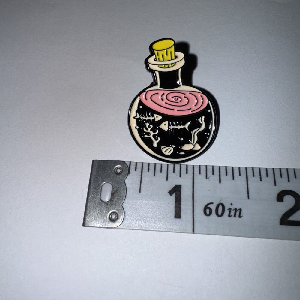 Small Potion Bottle Filled With Bones Pin Brooch